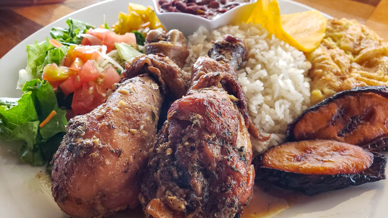 Casado with Caribbean style chicken at Sabor Tico Restaurant in Monteverde.