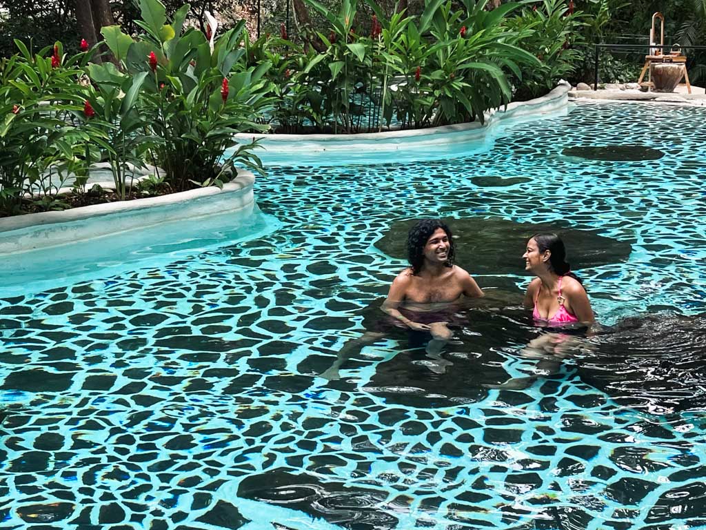 Couple, relaxing at the thermal water pool of Vandara Hot Springs.