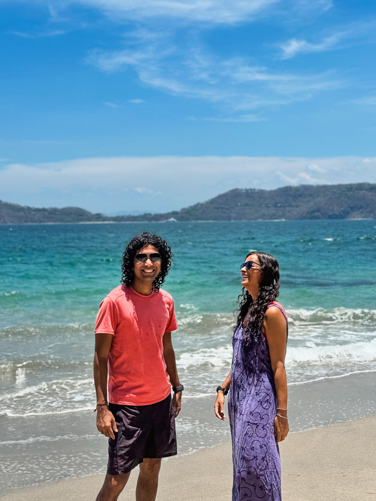 Couple in a cheerful mood at Playa Bonita.