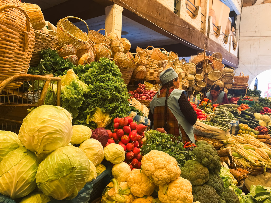 Sellers selling fresh vegetables at the Central Market of Sucre.