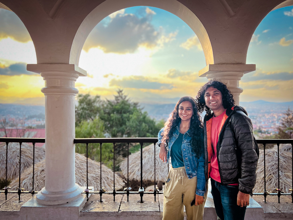 A man and a woman standing in the La Recoleta viewpoint in Sucre