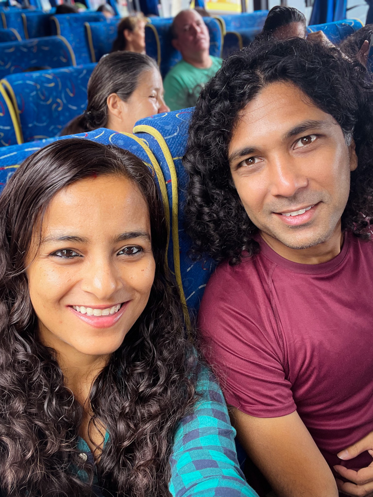 Selfie of a couple Inside the bus, on the way to La Fortuna.