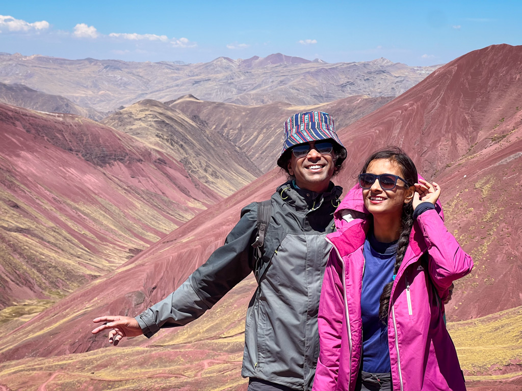 Digital nomad couple enjoying a day out, hiking in the Red Valley, a day trip from Cusco.