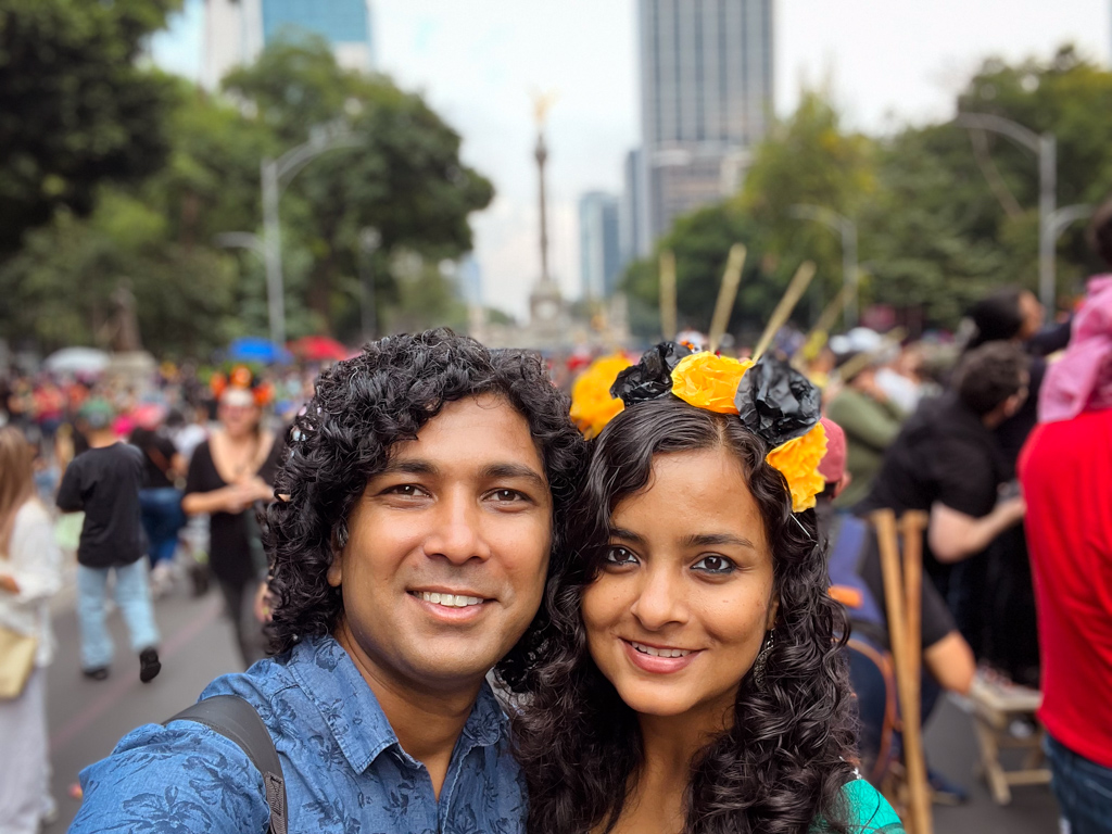 Couple posing for a selfie, before the start of Day of the Dead Grand Parade in Mexico City.