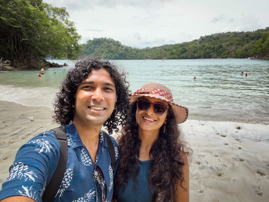 A couple posing for a selfie at Biesanz Beach, Manuel Antonio.