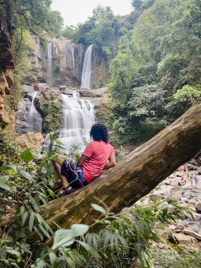 Man, enjoying some quiet time by the Nauyaca Waterfalls.