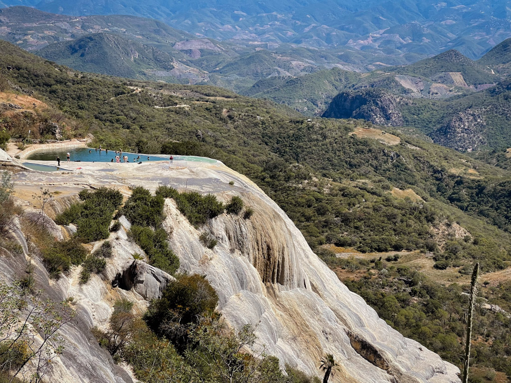 Hierve El Agua view during the hike - the petrified waterfall and the natural infinity pool.